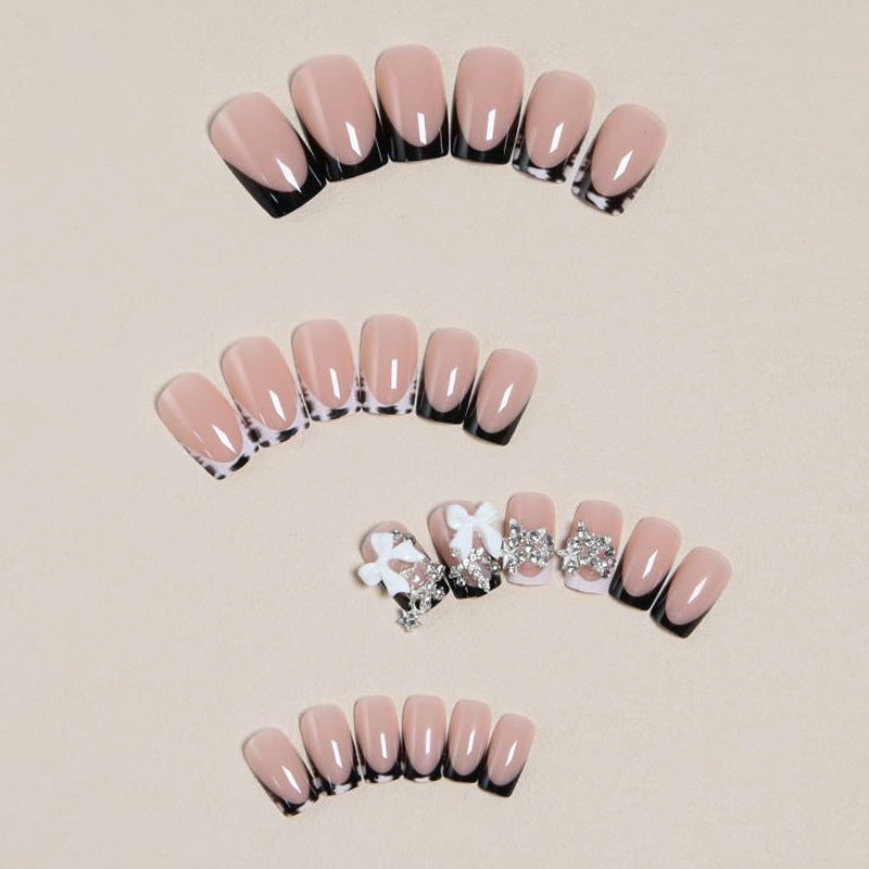 Elegant artificial nails with detailed embellishments Kalsten