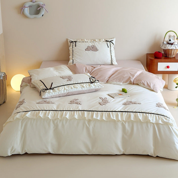 Romantic duvet cover set with embroidered bunnies, ruffled edge and reversible function