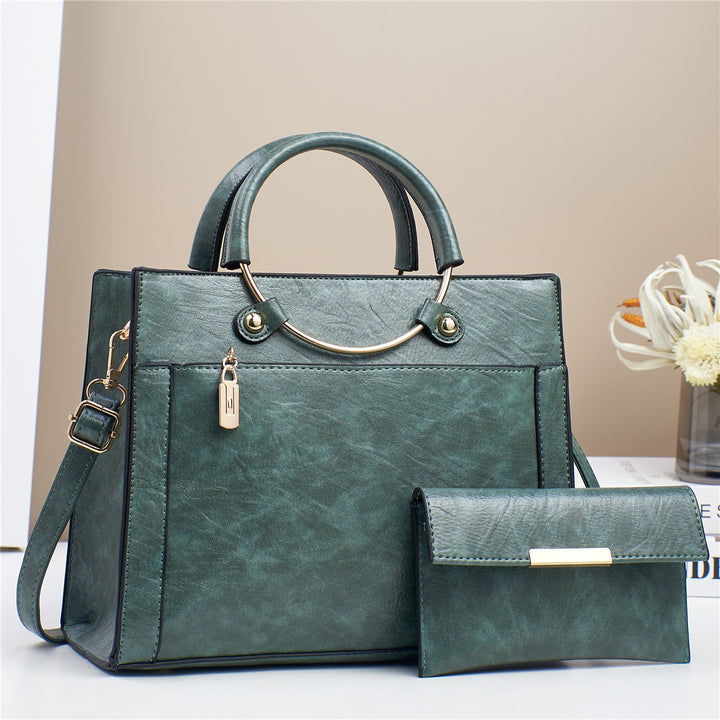 Elegant handbag with detachable shoulder strap and matching wallet Kalsten