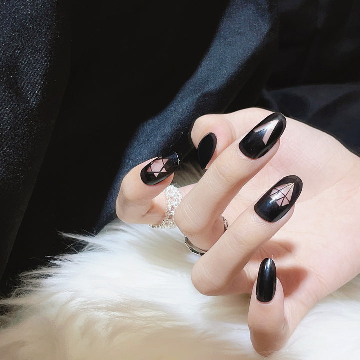 Artistic Press-On Nail Set with Geometric and Symbolic Designs