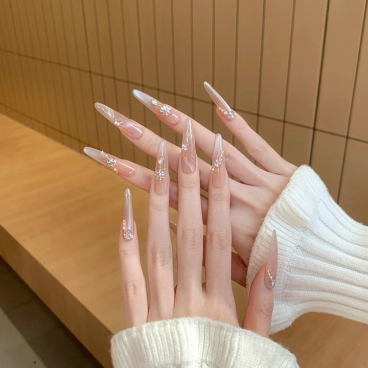 Exquisite Stiletto Nail Extensions with Crystal Accents