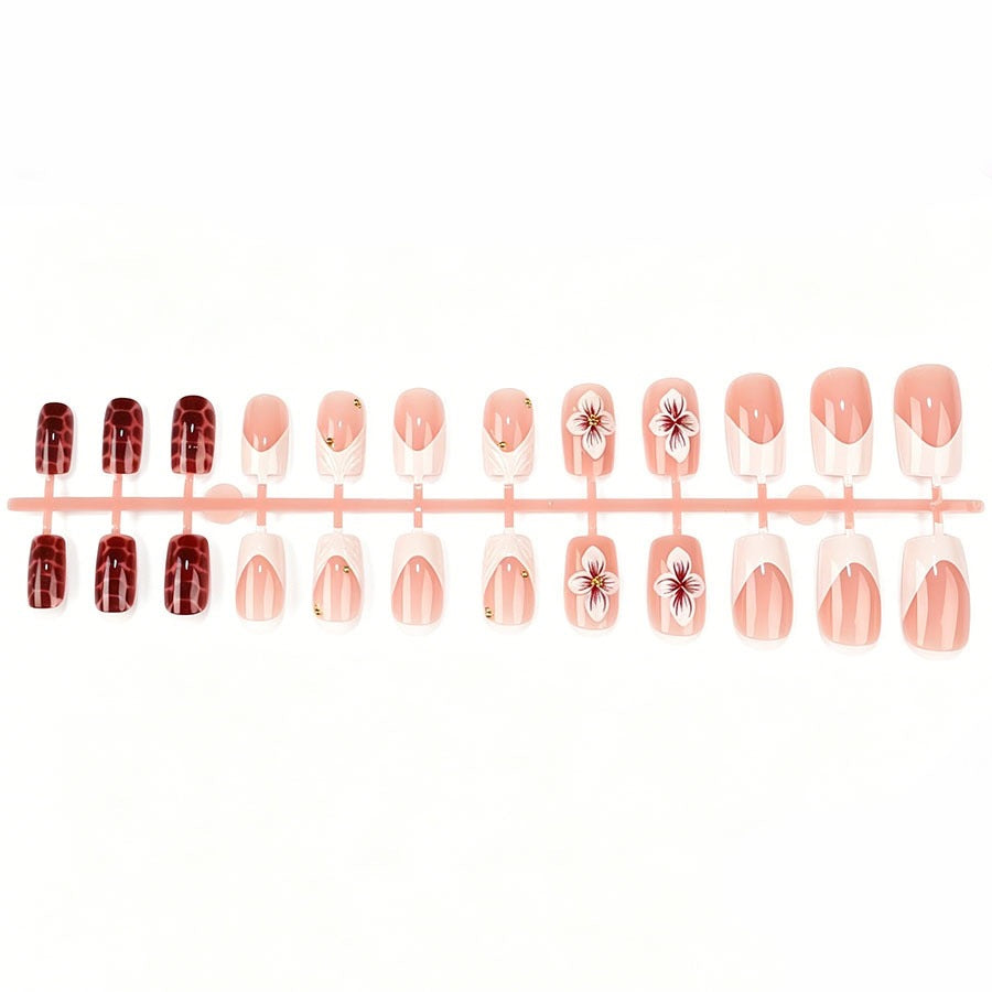 Artificial nail set with luxurious 3D flower accents and glitter details Kalsten