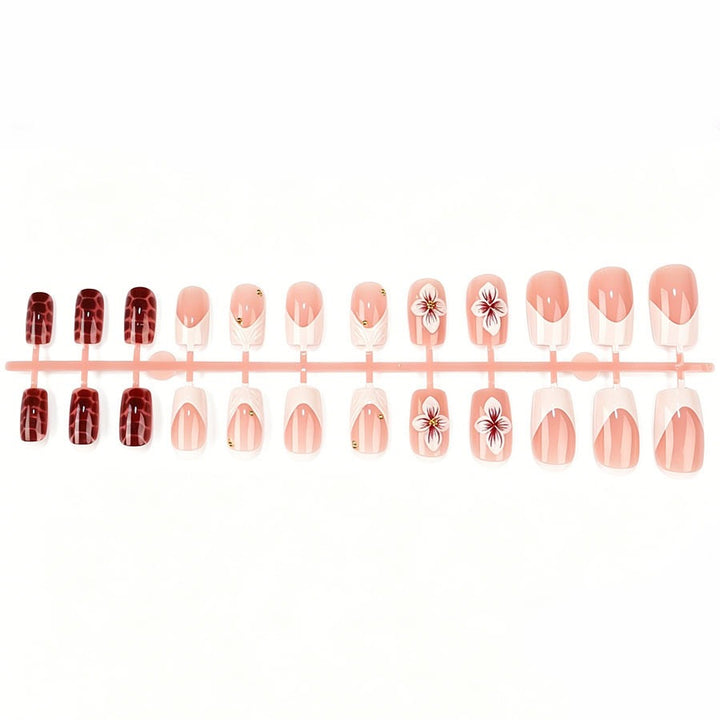 Artificial nail set with luxurious 3D flower accents and glitter details Kalsten