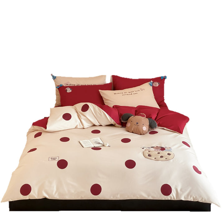 Children's bedding set with embroidered car applique and pompom detail