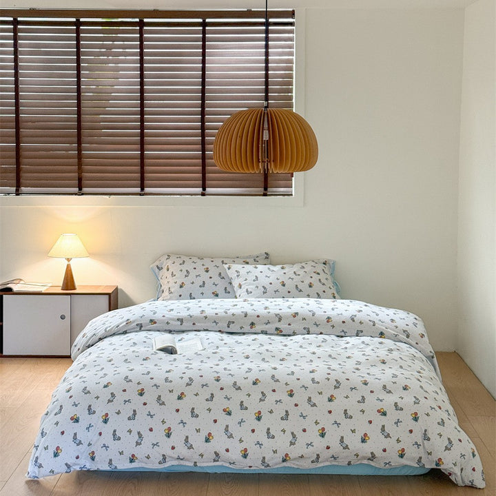 Cotton duvet cover set with subtle animal and balloon illustration, breathable all-season quality