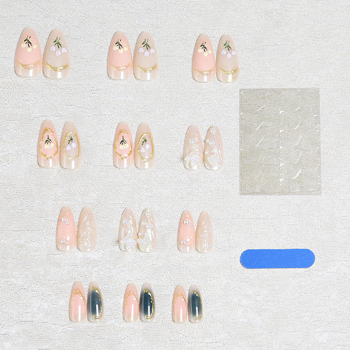 Nail art set with filigree floral decorations Kalsten
