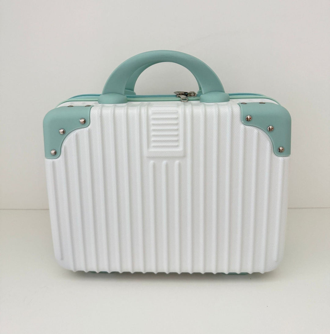 compact hard-shell travel vanity cosmetic and tech organizer with ribbed shell reinforced corners removable padded insert Kalsten