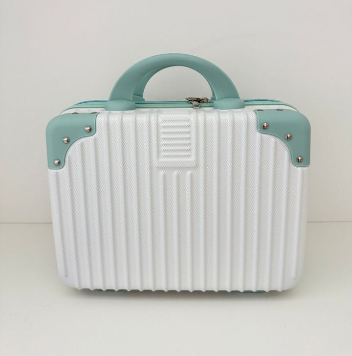 compact hard-shell travel vanity cosmetic and tech organizer with ribbed shell reinforced corners removable padded insert Kalsten