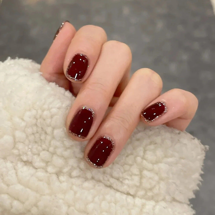 Artificial nails with heart accent and glamorous decorations Kalsten