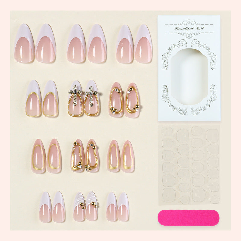 Artificial nail set with luxurious gold embellishments and elegant designs Kalsten