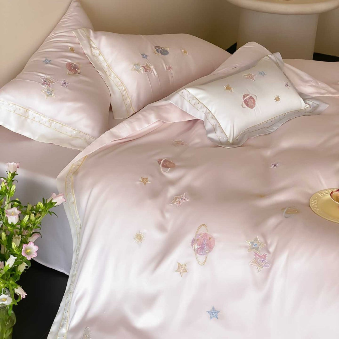 Satin bedding set with embroidered galaxy motif and silky smooth finish