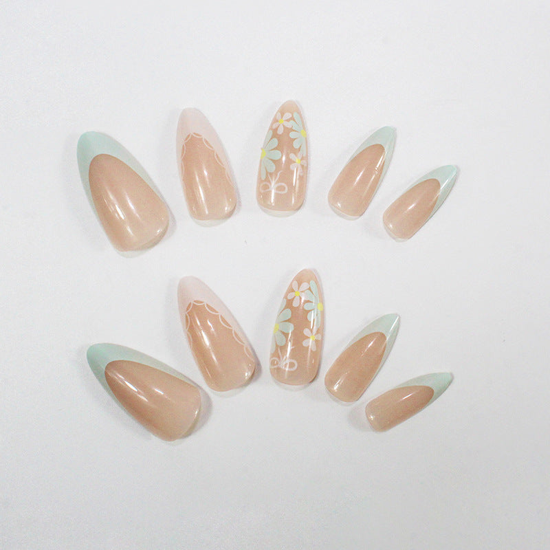 Acrylic nail set with floral accents and elegant tips Kalsten