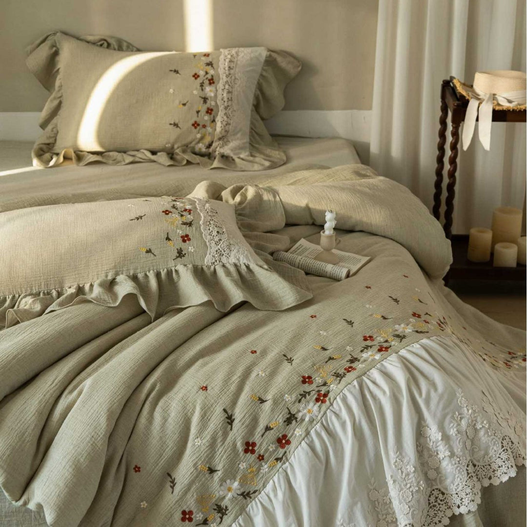 Romantic bedding set with lace bed skirt, embroidered floral decor and ruffle