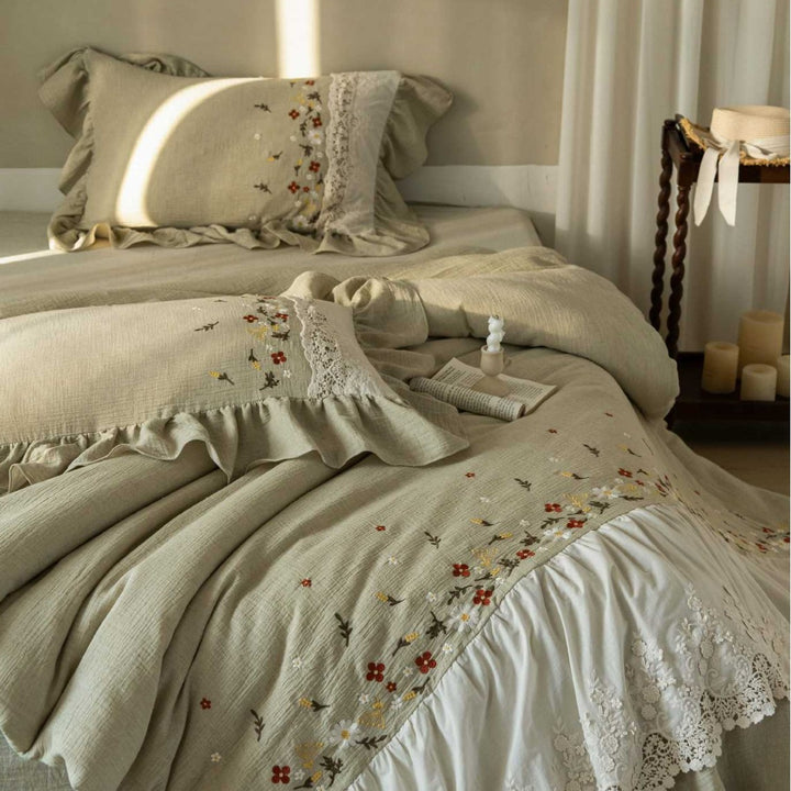 Romantic bedding set with lace bed skirt, embroidered floral decor and ruffle