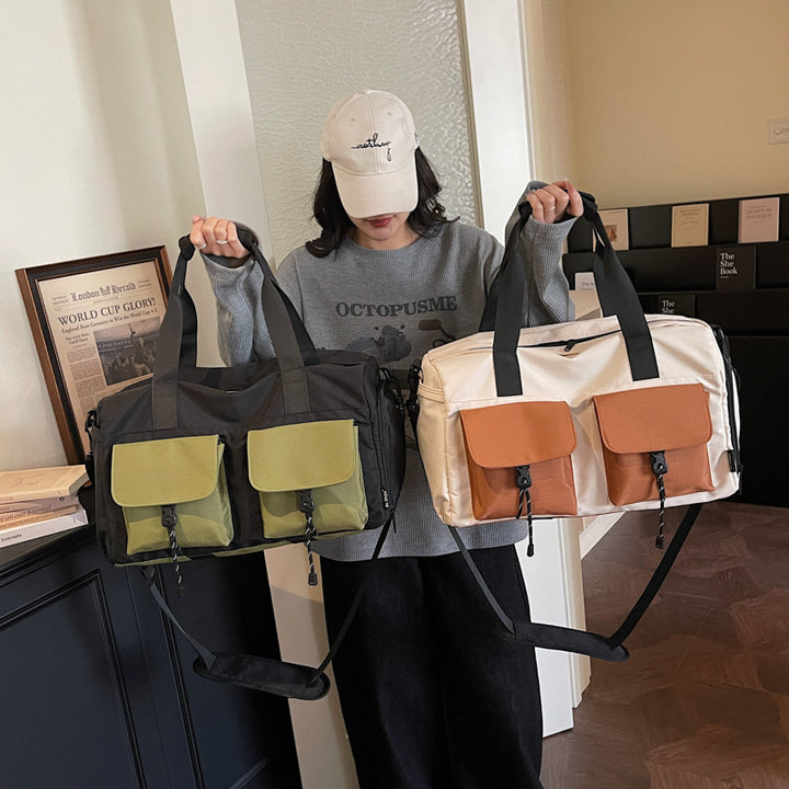 Multifunctional tote bag with comfortable shoulder padding and numerous outer pockets Kalsten