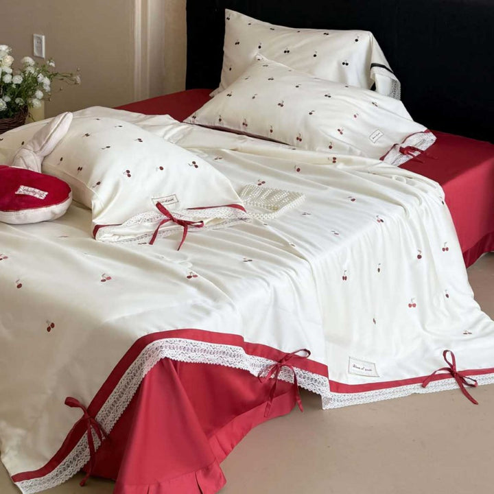 Luxurious cotton satin bedding set with cherry print, lace trim and frill