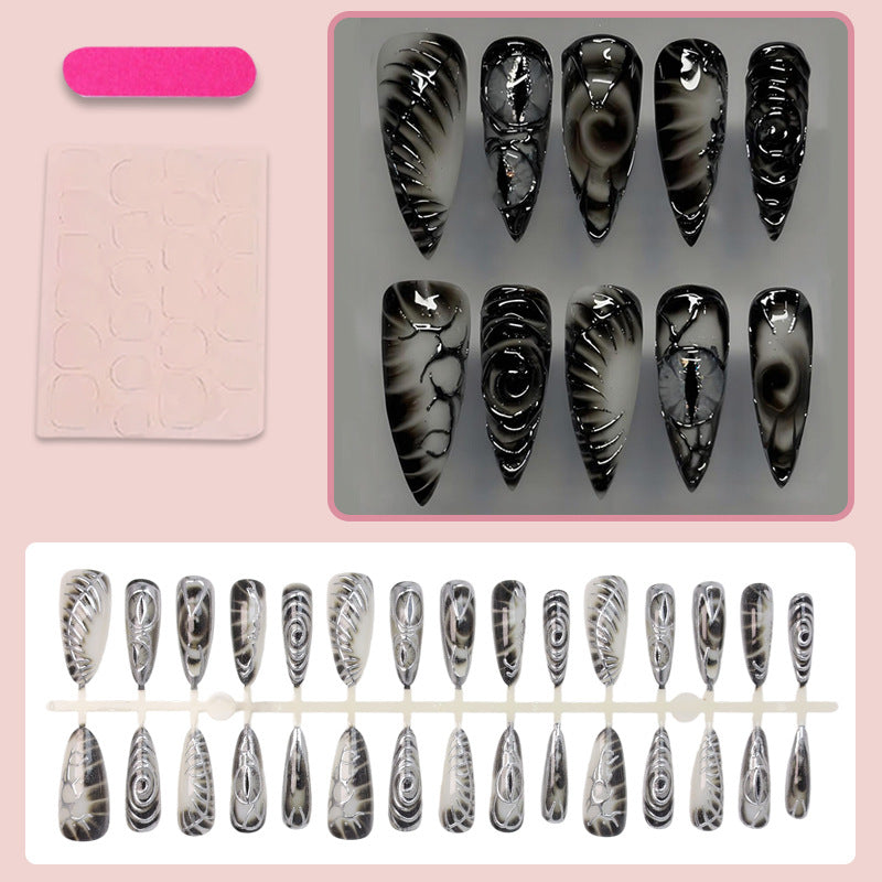 Artificial nail set with modern spiral pattern and shiny accents Kalsten