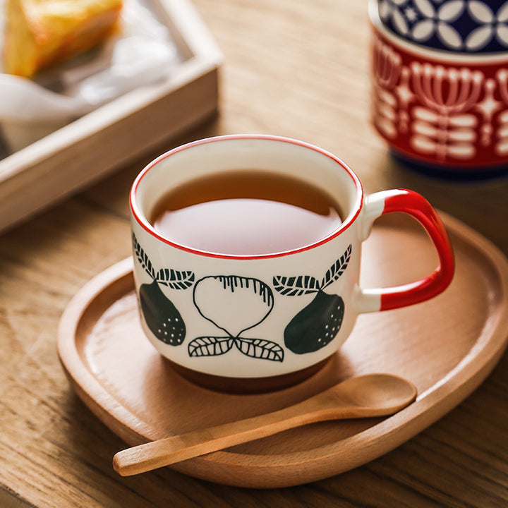 Ceramic mug with retro polka dot design and ergonomic handle
