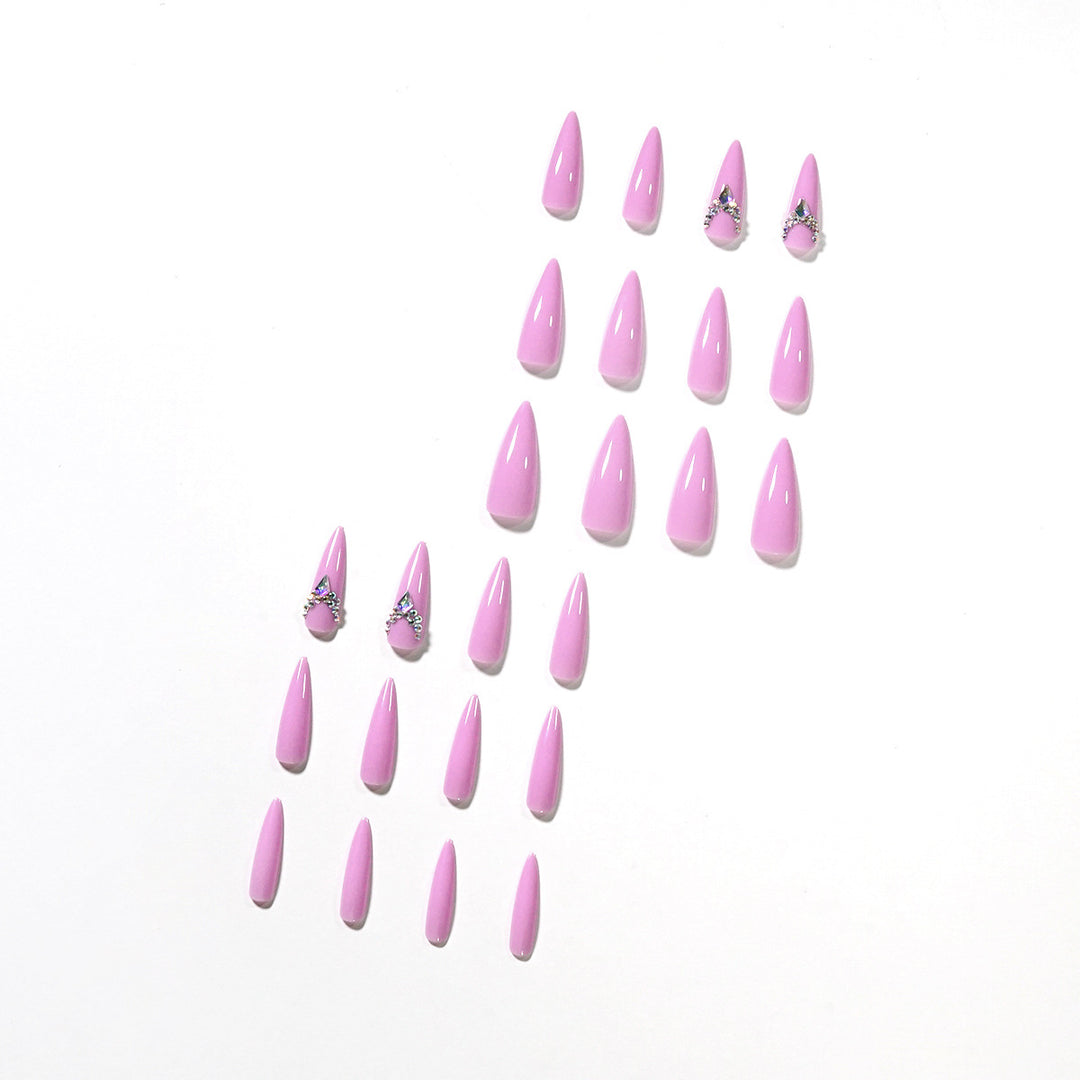 Glamorous stiletto nails with rhinestone decoration Kalsten
