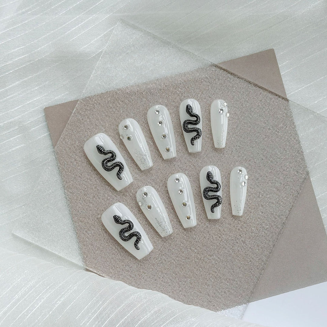 Artistic Press-On Nail Art Set with Heart and Celestial Designs