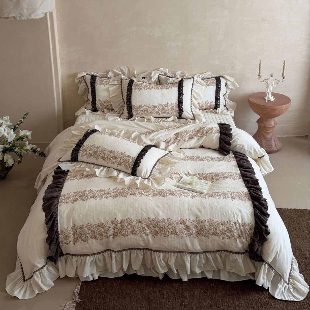 Vintage-inspired country house bedding set with ruffles and floral ribbon embroidery