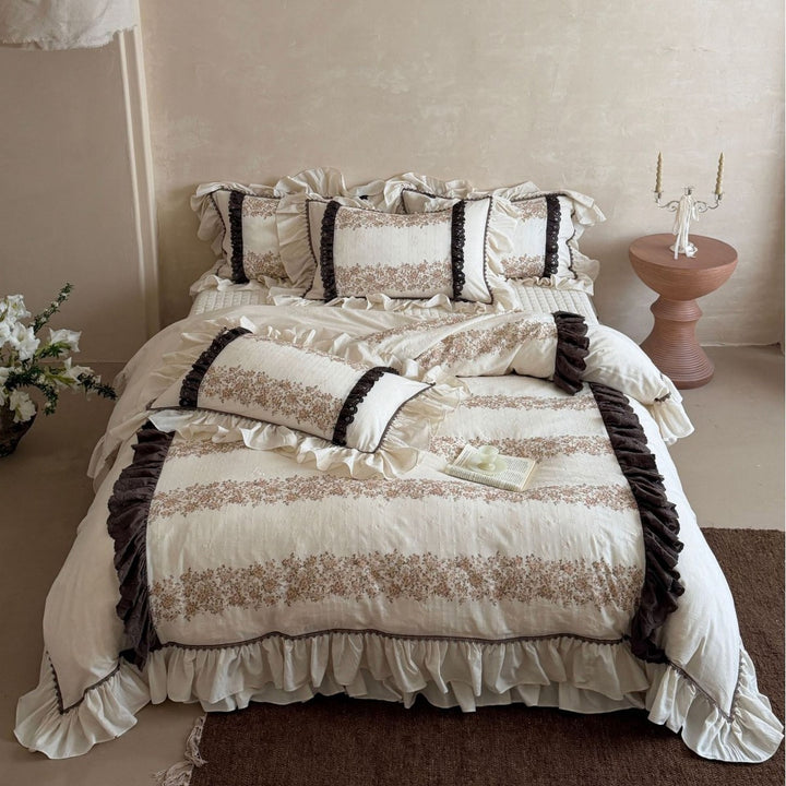 Vintage-inspired country house bedding set with ruffles and floral ribbon embroidery