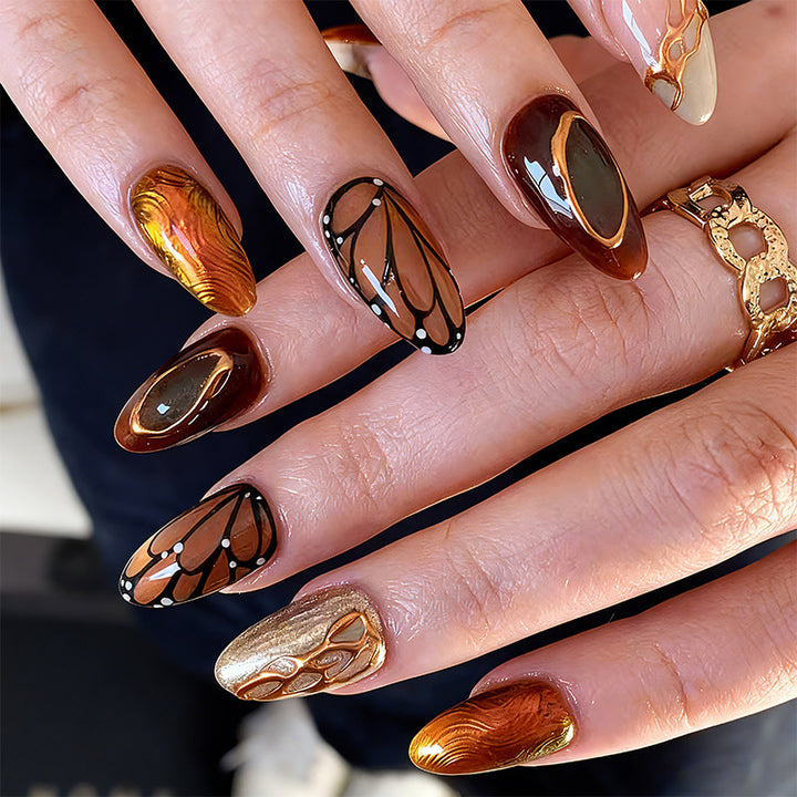 Artificial nail set with elegant gold and black design Kalsten