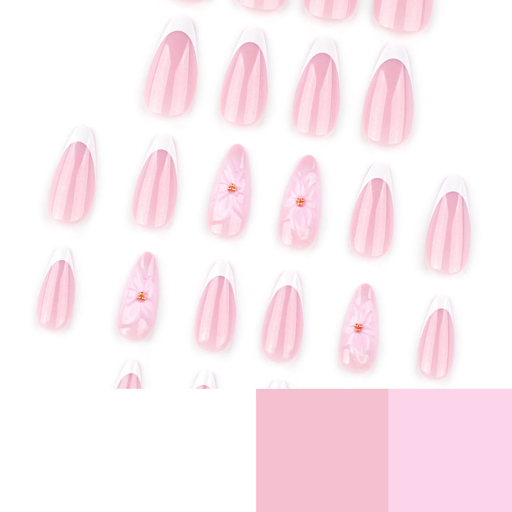 Artistic French-Tip Nail Extensions with Flower Accents Kalsten