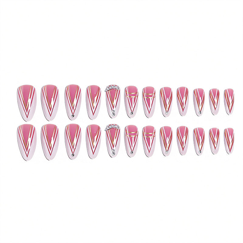 Acrylic nail set with elegant stiletto shape and luxurious embellishments Kalsten