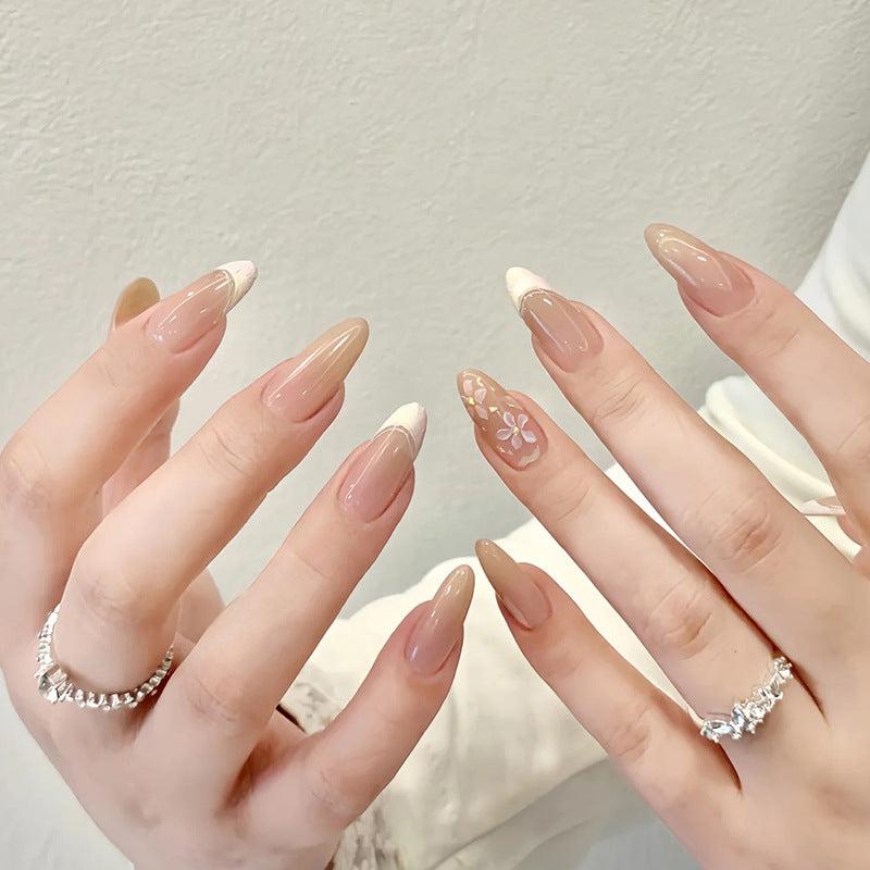 Artificial nails with sweet animal motifs and elegant French tip design Kalsten