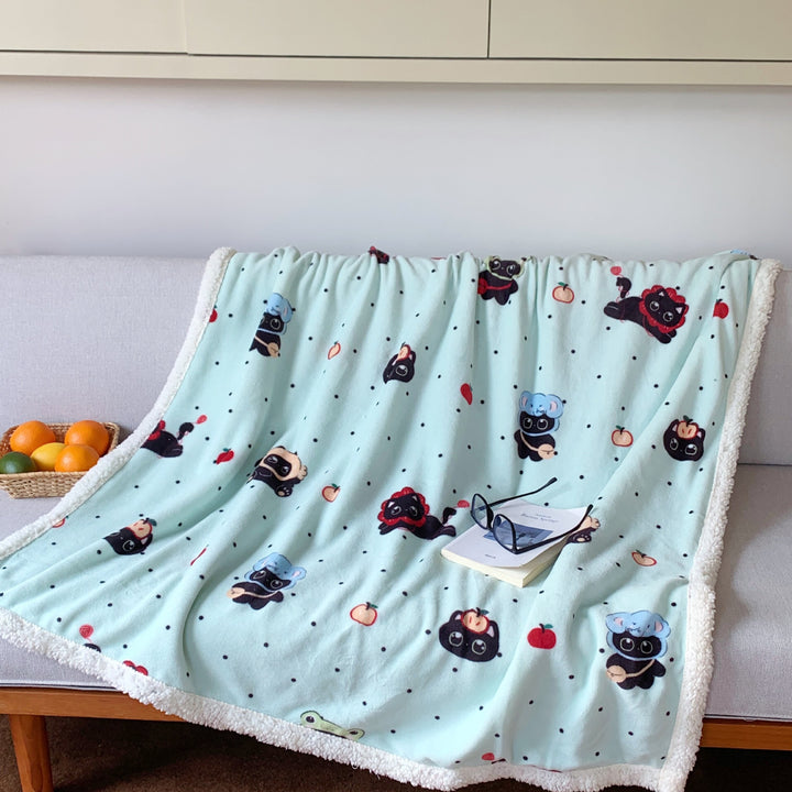 Reversible fleece blanket with cartoon cat design and teddy lining