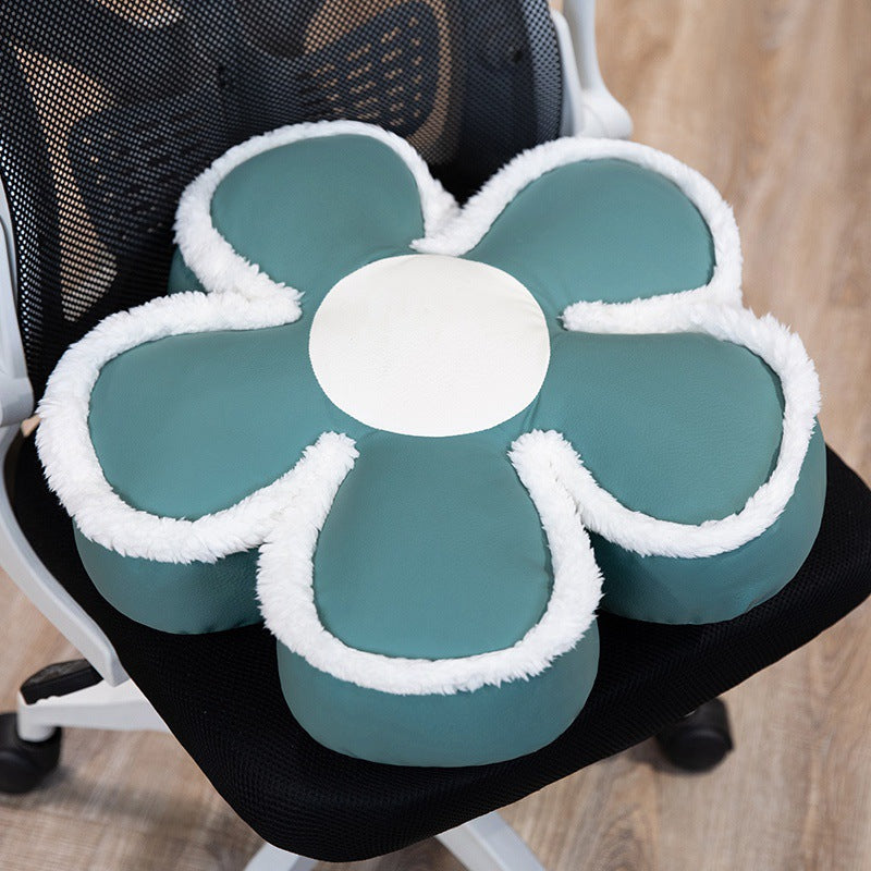 Padded seat cushion in flower shape with faux leather center piece and fluffy edge padding
