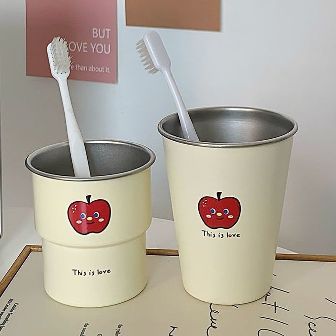 Multifunctional ceramic mug with cheerful apple design Kalsten