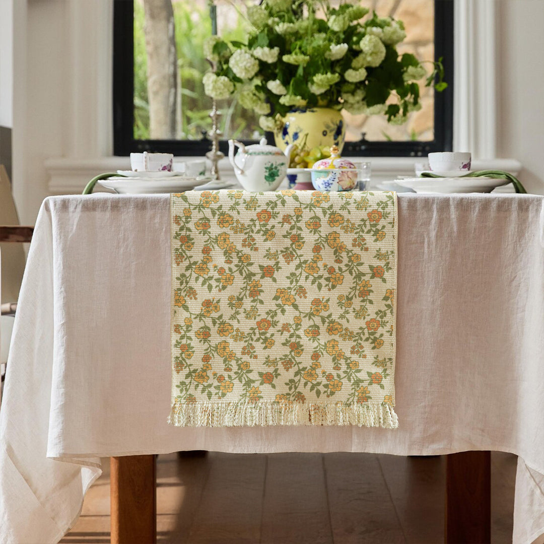 Jacquard table runner with floral vine structure and decorative fringes Kalsten