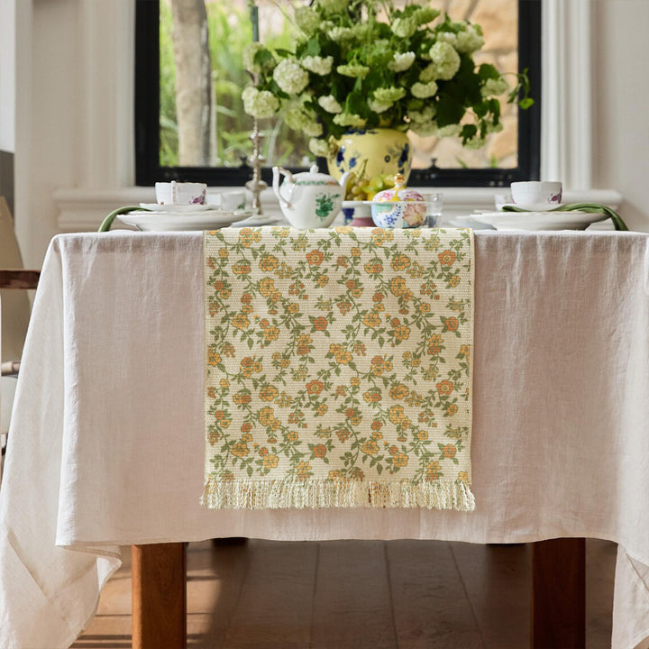 Jacquard table runner with floral vine structure and decorative fringes Kalsten