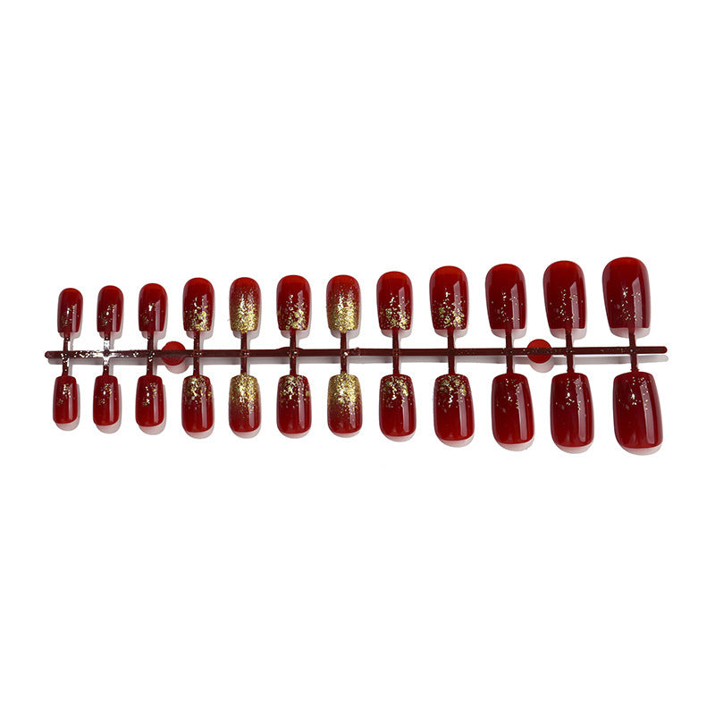 Acrylic nail set with sparkling accents and festive design Kalsten