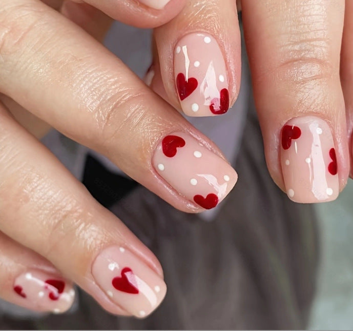 Heart-Embellished Nail Art Design Kalsten