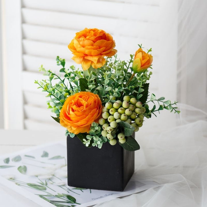 Lifelike Floral Arrangement in Decorative Square Planter