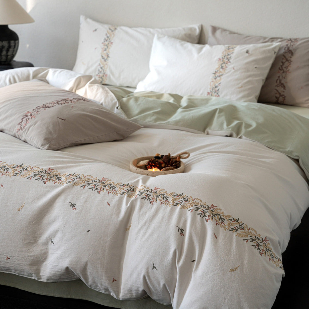 Embroidered cotton percale duvet cover set with fine floral border