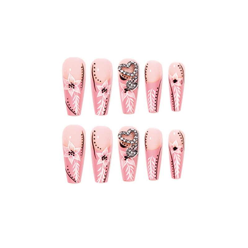 Artistic nail art with flower and heart motifs Kalsten