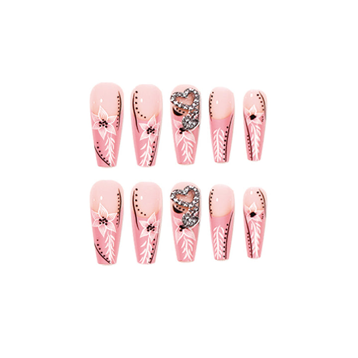 Artistic nail art with flower and heart motifs Kalsten