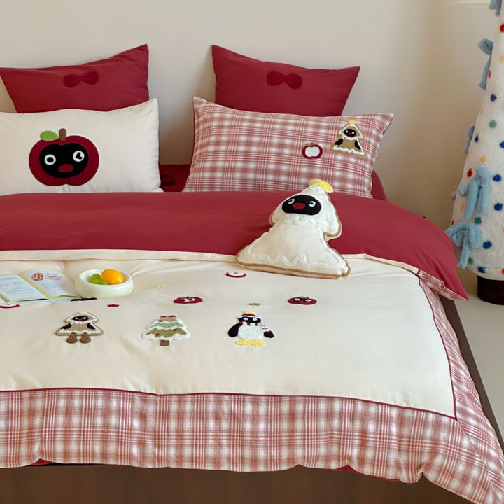 Children's bedding set with appliquéd winter figures and checkered ruffle