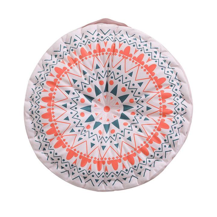 Round floor cushion with medal print, carrying handle and quilted padding