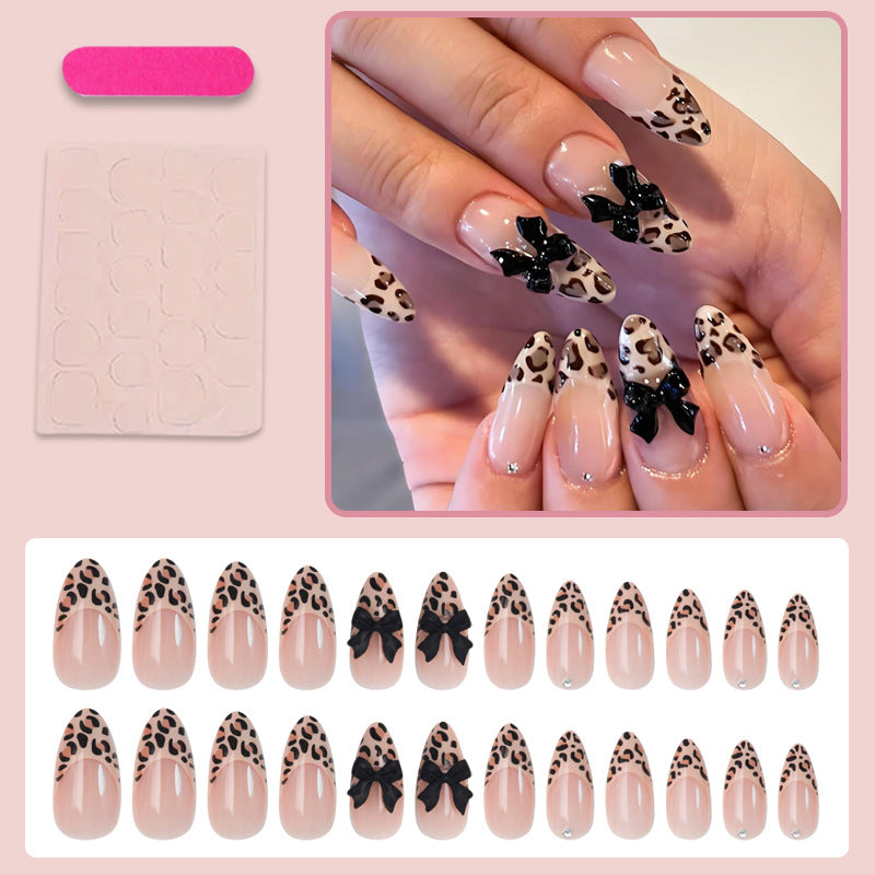 Animal-themed artificial nail set with elegant bows Kalsten