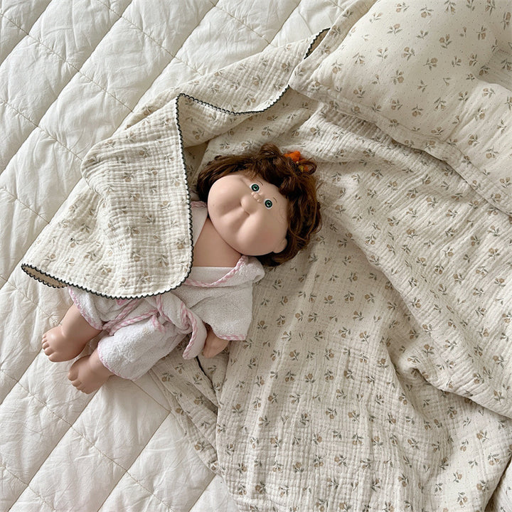 Unisex Muslin Blanket with delicate floral design and elegant ruffles Kalsten