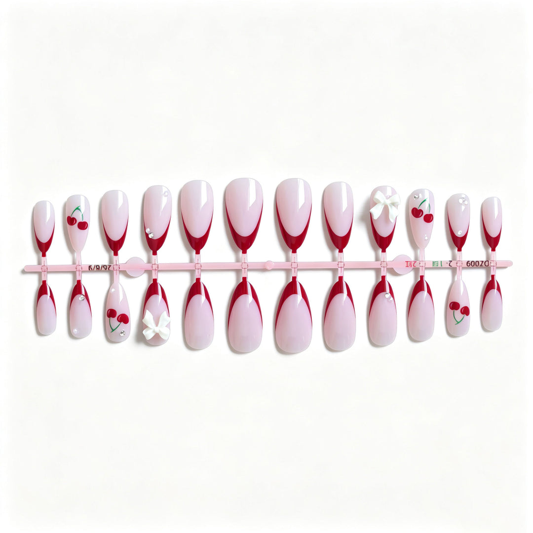 Artistic Cherry and Bow Nail Art Design