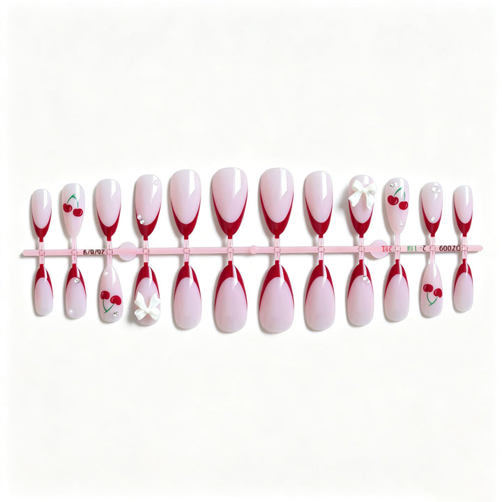 Artistic Cherry and Bow Nail Art Design