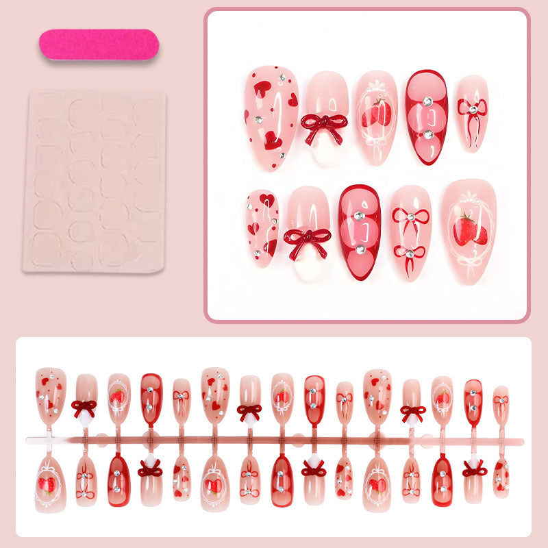 Artificial nail set with cute heart and bow designs Kalsten