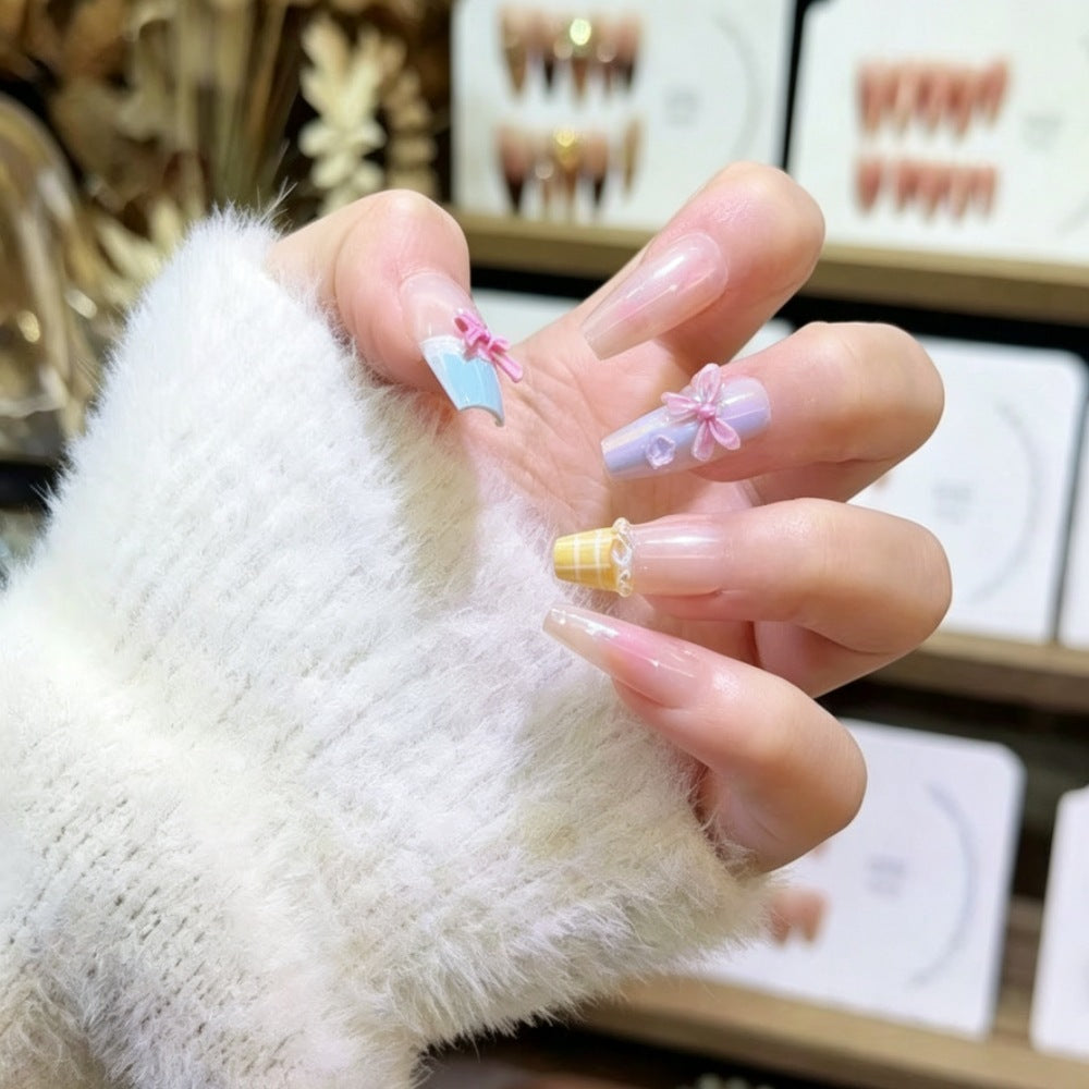 Artistic Glittered Stiletto Nail Enhancements