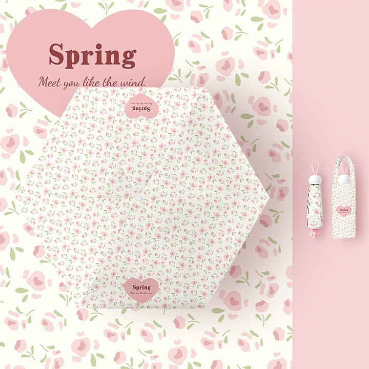 Ladies folding umbrella with playful flower design Kalsten